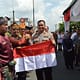 Pembagian 3.250 Bendera Merah Putih, Polres Asahan Turut ikut melakukan pengamanan